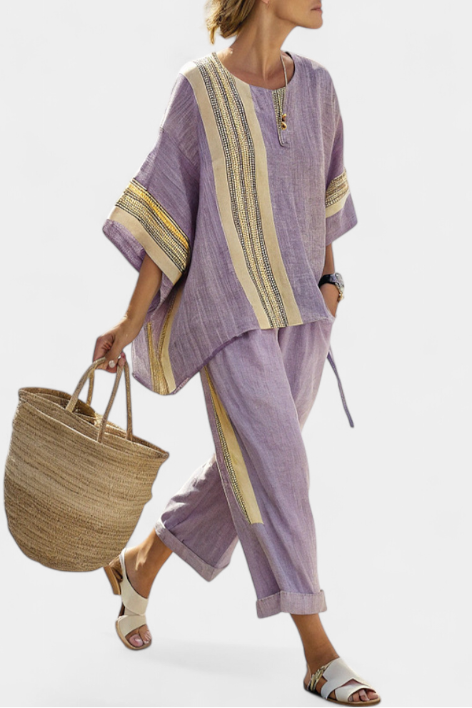 Daniela – elegant lavender top and mustard striped trousers