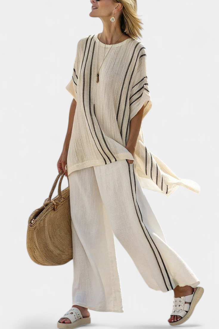 Raffaella – Elegant ivory linen blouse and black striped trousers