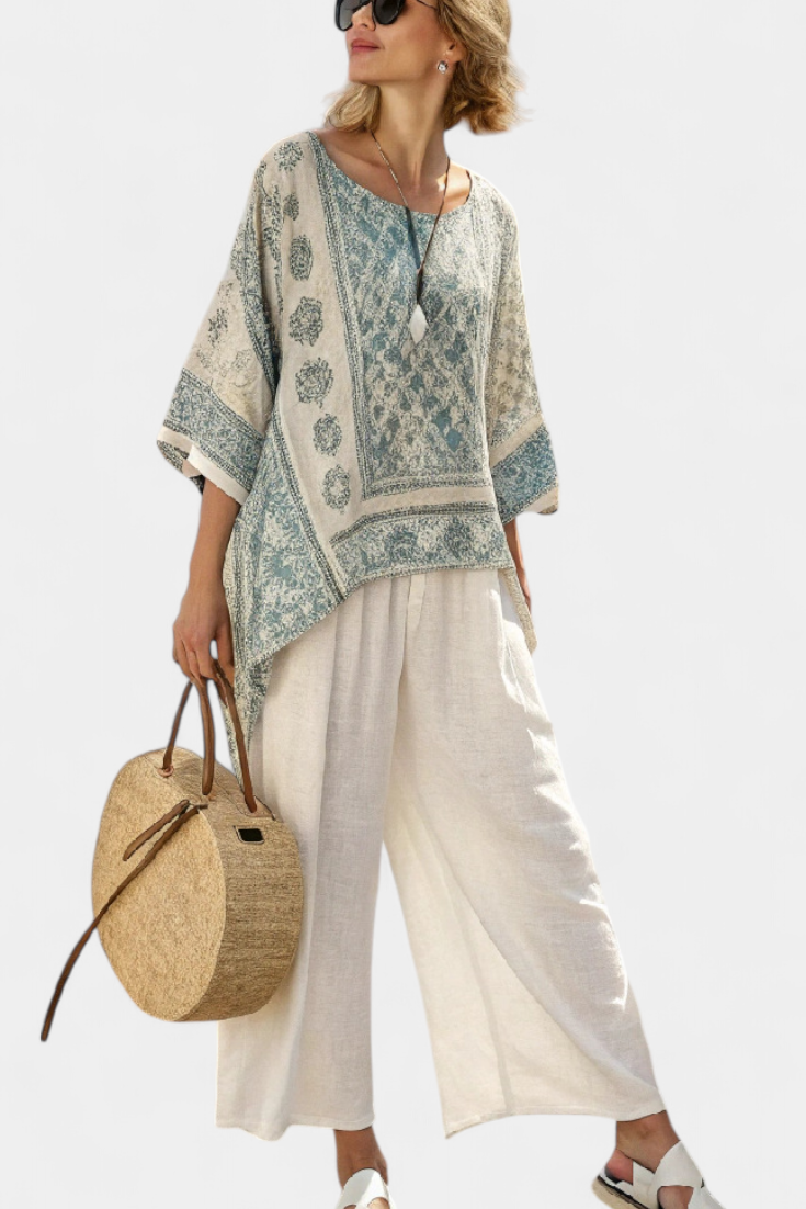 Annalisa – comfortable printed blouse and white wide-leg trousers